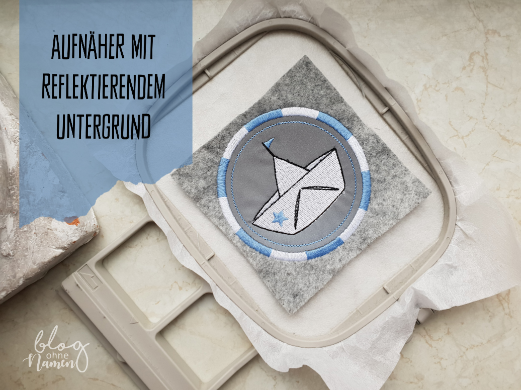 Aufnäher mit reflektierendem Untergrund – Stickerei auf reflektierendem Gewebe und Bügelfolie