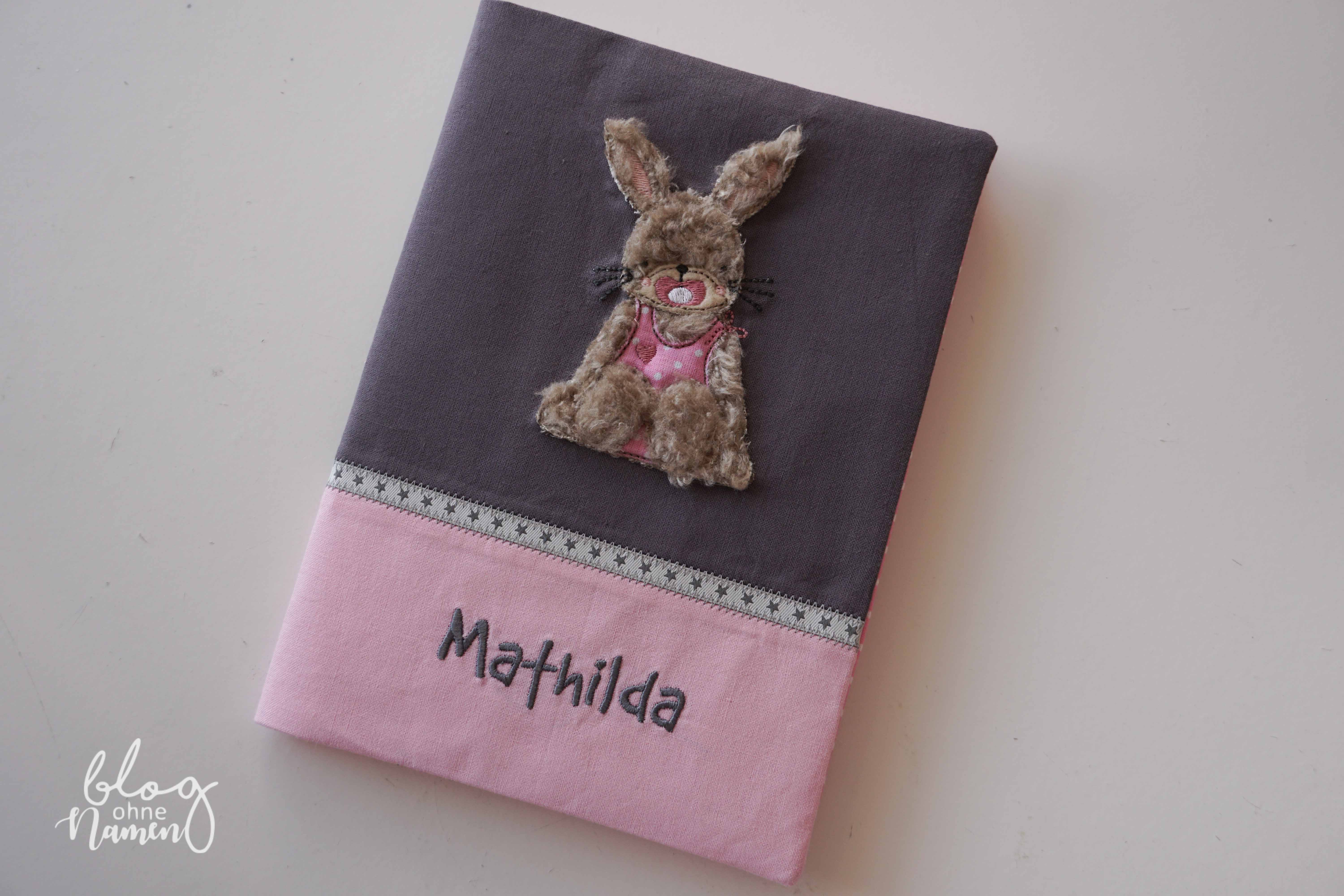 Stickdatei von Stickherz auf U-Heft Hülle Hanni