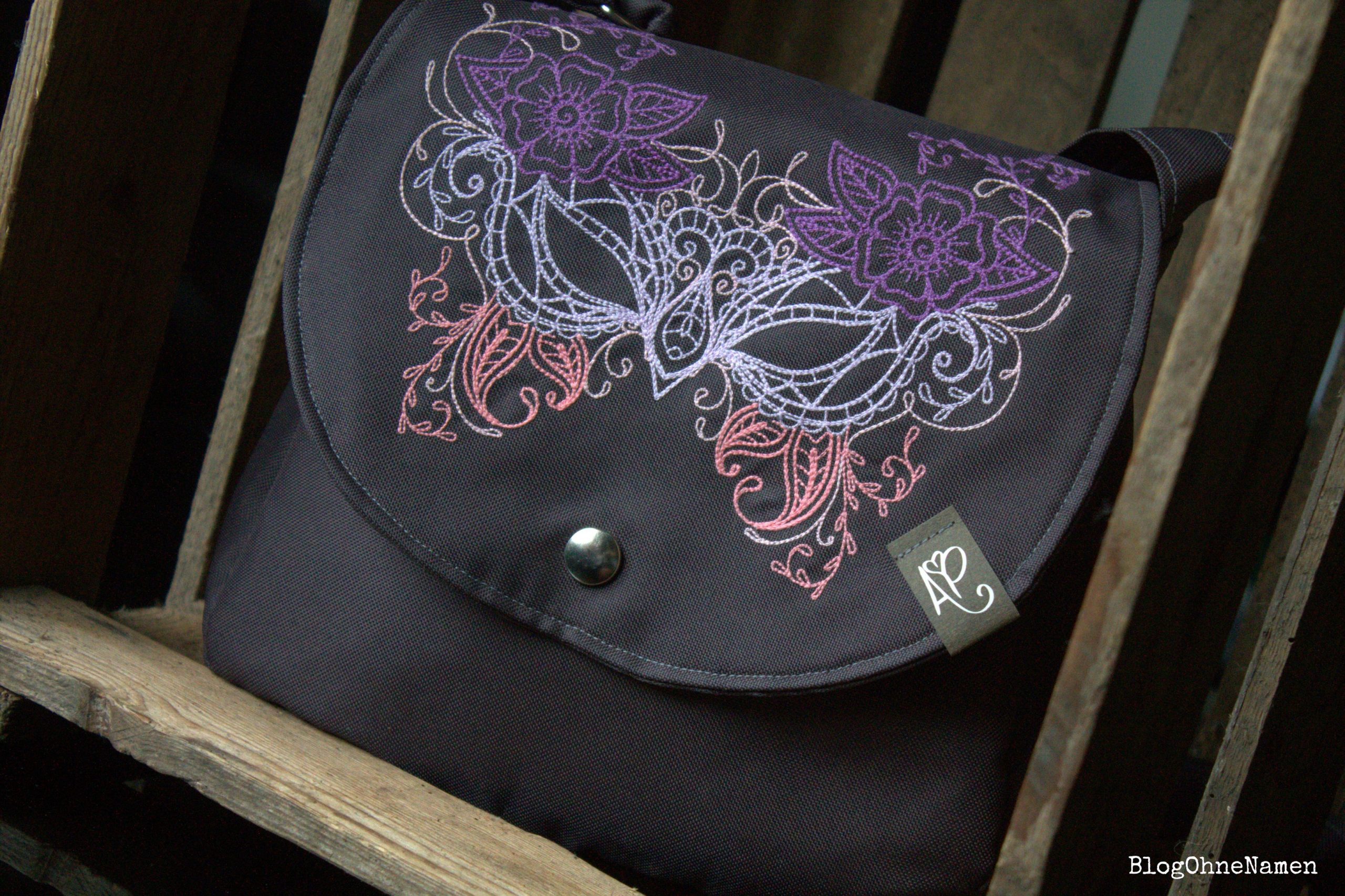 Zirkeltasche mit Stickerei für Messebesuch